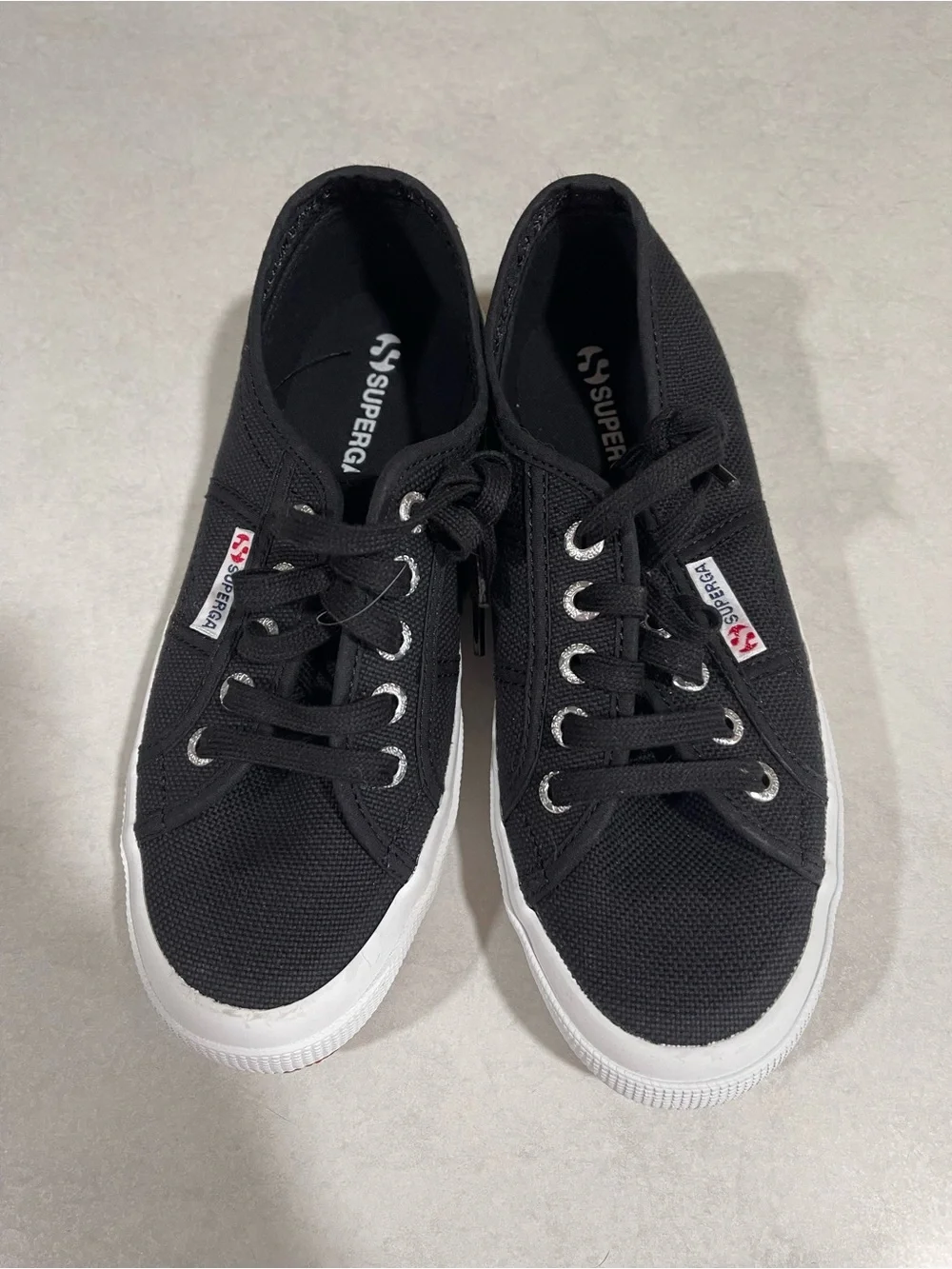 Superga women’s Black Canvas Low-Top Sneakers with White Soles